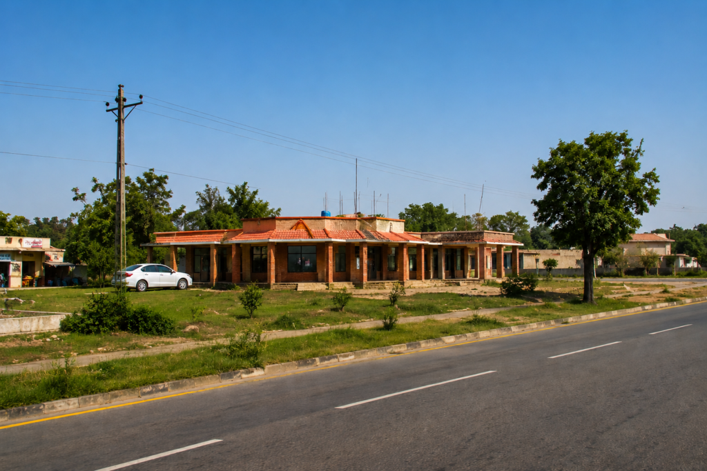 Commercial plot with roadside access in Kallar Kahar, Pakistan, suitable for shops, offices, restaurants, or business investment.